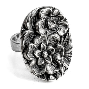 Sterling floral repousse ring